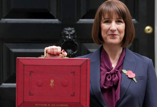 REEVES BETWEEN A ROCK AND A HARD PLACE ON UK BUDGET