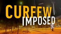 CAYMAN UNDER CURFEW