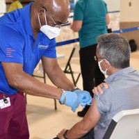 Dr Lee pleased with roll out of vaccination programme