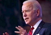 BIDEN STARTS IMMIGRATION SHIFT ON SOFTER TONE