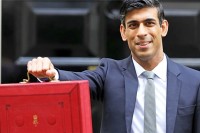 TAXING TIMES AS UK PLANS COVID EXIT STRATEGY