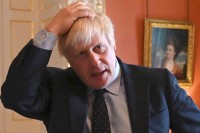 UK PRIME MINISTER UNDER INTENSE POLITICAL PRESSURE