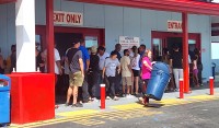 Shoppers Clamor as Cayman Braces for Hurricane Beryl
