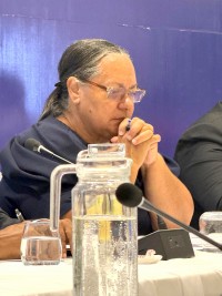 CAYMAN WEATHERS THE POLITICAL STORM