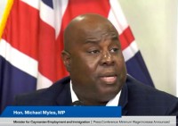 NEW MINIMUM WAGE IS JUST A START, SAYS MIN. MYLES