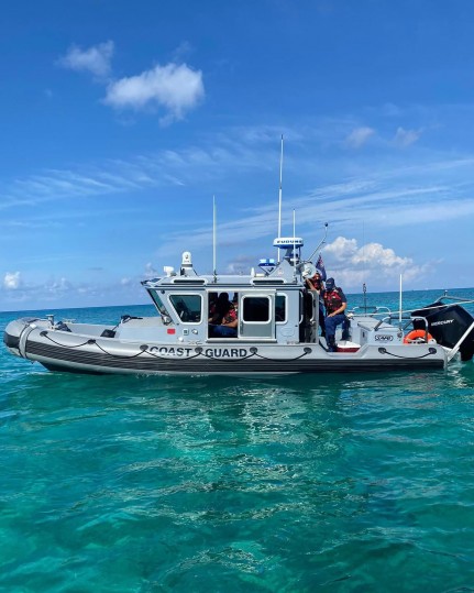 CICG and RCIPS Helicopter Intercept Vessel in Cayman Waters