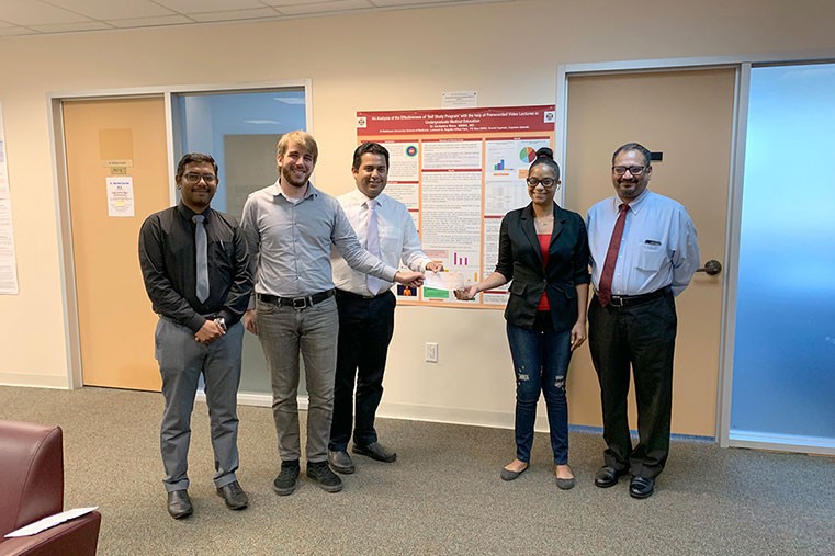 St Matthew’s University donates funds to the Cayman Heart Fund