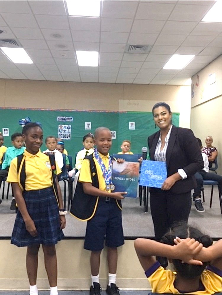 Prospect Primary students accept the Bendel Hydes Catalogue on behalf of their school