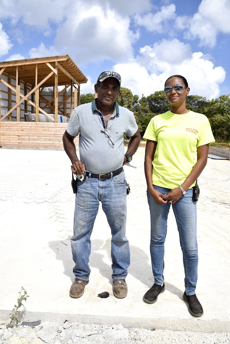 Farm manager Obed, pictured with Sasha Appleby, Manager of the Cocnut-oil plant