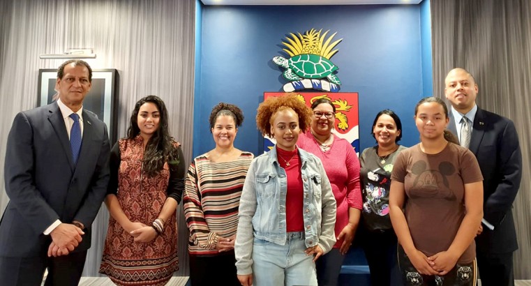 GirlForce Group with L-R - Charles Parchment Deputy Representative, Suhina Lally, Renee Caudeiron, Kristina Ebanks, Katrina Ebanks, Yeny Rego, Asia Bush and Andre Ebanks, Cayman Islands Representative