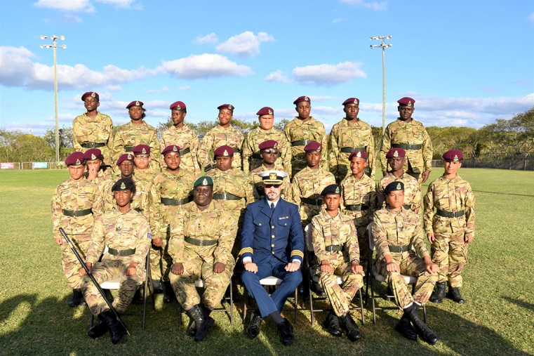 A Group Photo of the 19 newly appointed cadets from the John Gray High School Detachment, along with persons seated from the left Staff Sergeant A Jackson, Lt A. Whyte, CDR R. Scotland, Cpl Hansraj T & Cpl Miller S
