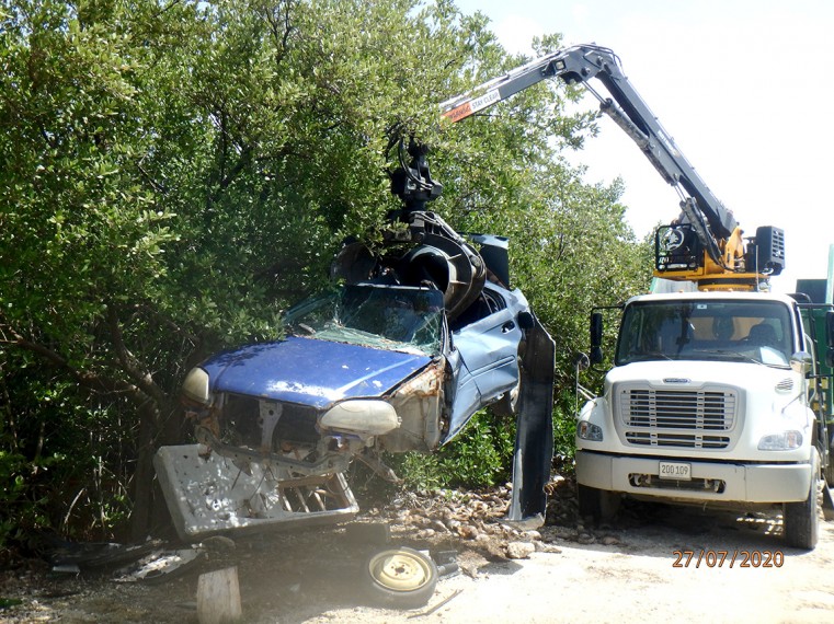 Removal of Blue Derelict Car