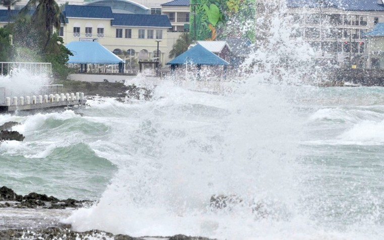 Laura lashes Cayman, but little damage reported