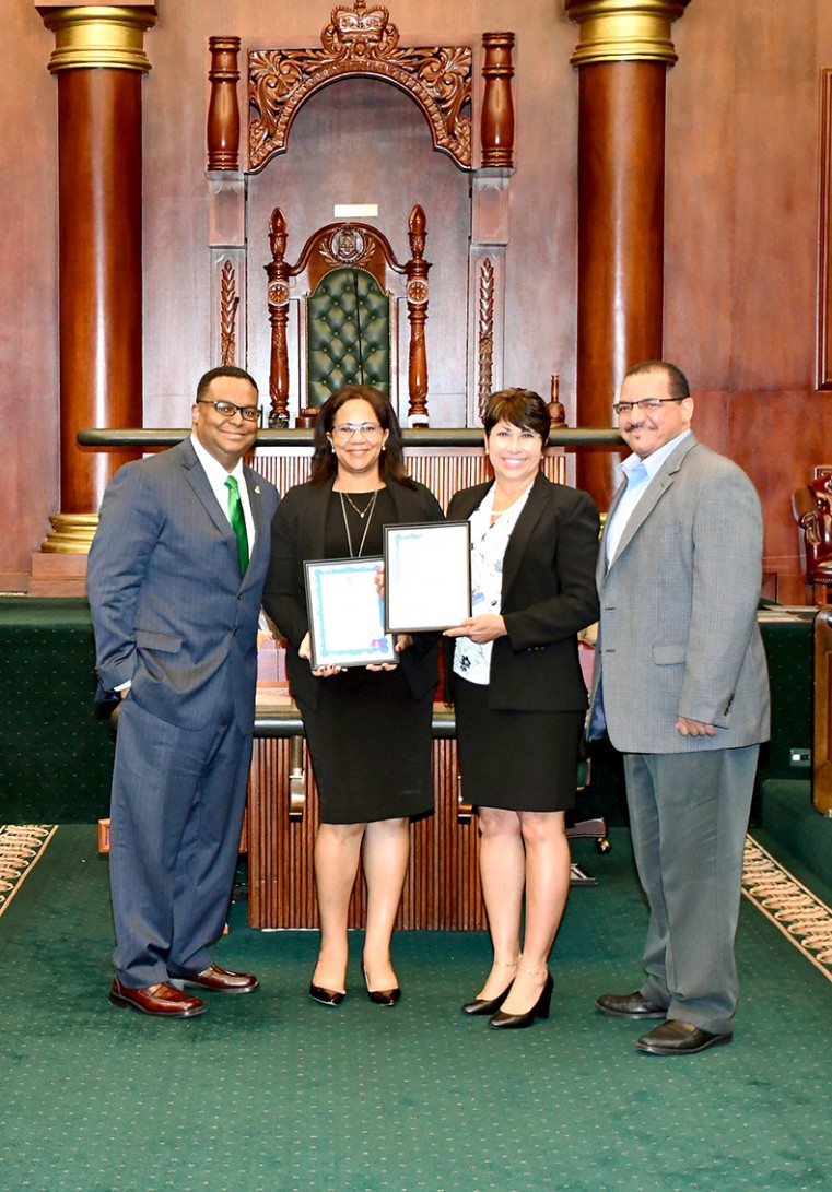(L-R) MLA Chris Saunders with HSA’s Chief Financial Officer Dawn Cummings, Chief Executive Officer Lizzette Yearwood and Deputy Board Chairman Rolston Anglin accepting the awards