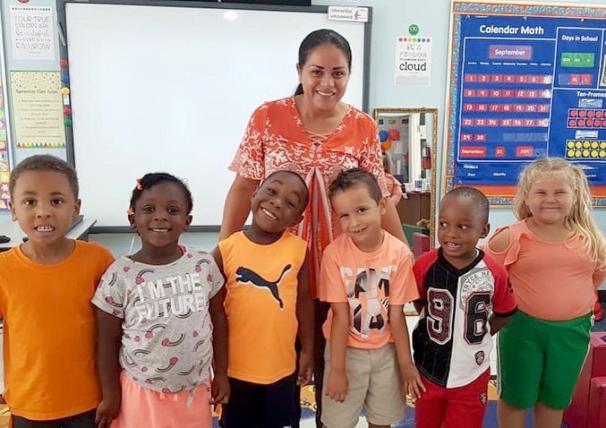 Students from Cayman Brac’s Spott & Creek Primary School supported Seniors Rock Dress Down Day with donations and rocking orange
