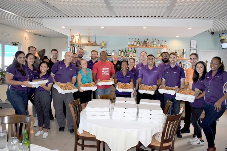 Grant Thornton get to work in the kitchen for Cayman Food Bank