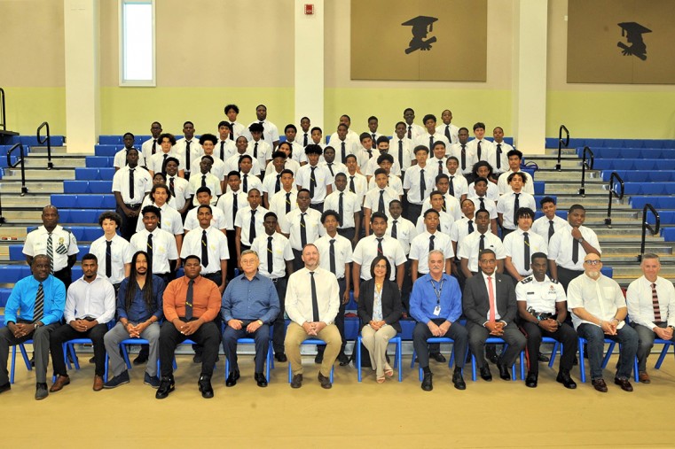 Boyz 2 Men, all the new members, with their smart black ties. In the front are adults who have helped with the programme