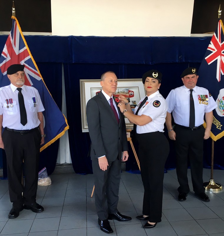 Shadden McLaughlin with Governor Martyn Roper, Association President Andrew McLaughlin (right), and Vice President Paul Ebanks (left)