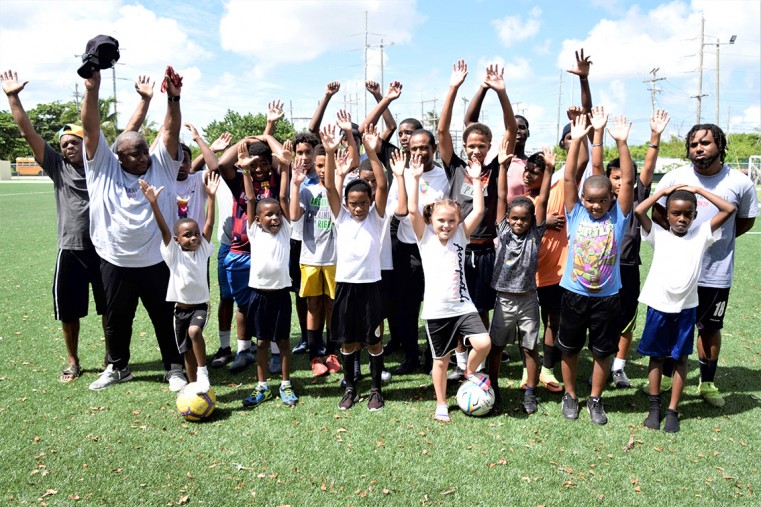 Just some of the kids, and volunteer coaches and other adults who give up their time to make the magic of football real for Cayman’s kids