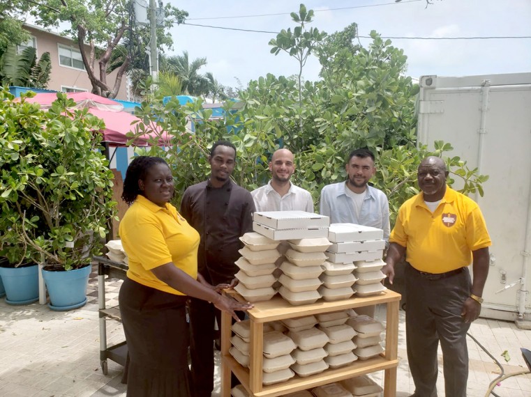 Non-Profit Distributes Food Packets