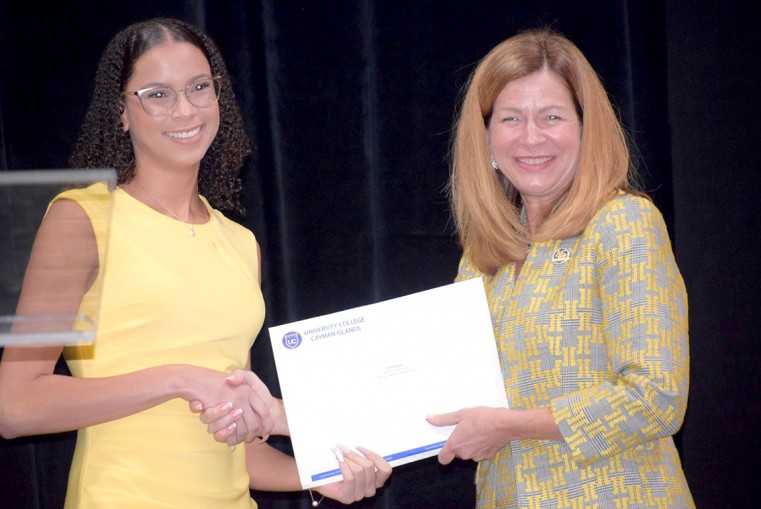 Ashley Bush, Fall 2019 Dean’s List, Spring 2020 President’s List, receives her certificate from UCCI President and CEO Dr. Stacy McAfee