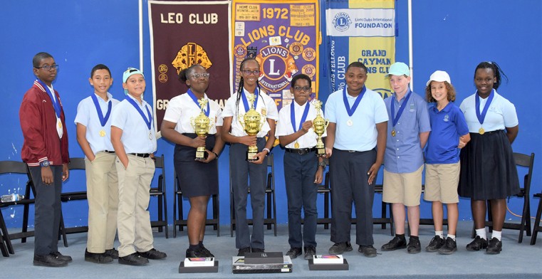 2020 Spelling Bee participants, left to right: Alex Curnock, CIS; Wilmer Gonzalez, CHHS; Jordan Cummings, JGHS; winner Tabitha Giscombe, LSHS; joint third place winner Diego Myles, CBCA; Henry Peedom,