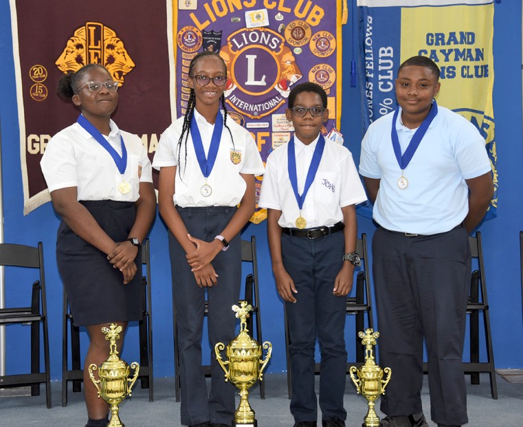 2020 Top secondary school spellers (l-r)   Suwayne Young-Watson (1st runner up),  Tabitha Giscombe (1st place), Garson Gardiner and Diego Myles (2nd runners up)