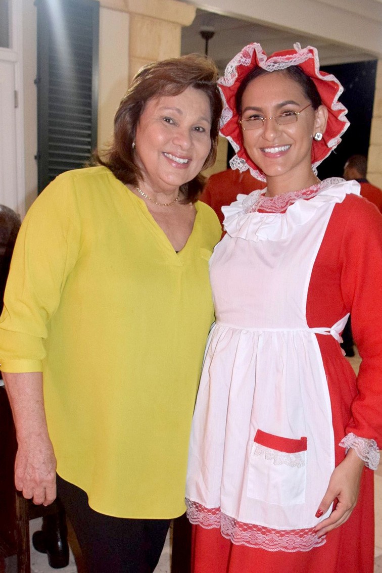 Heather Bodden pictured with Miss Cayman Universe, Mariah Tibbetts as Mrs Claus