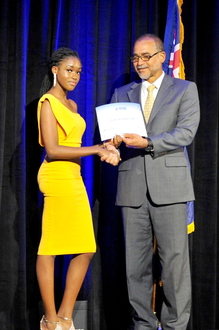 Leah Robinson receives her award from Mr. Joel Francis