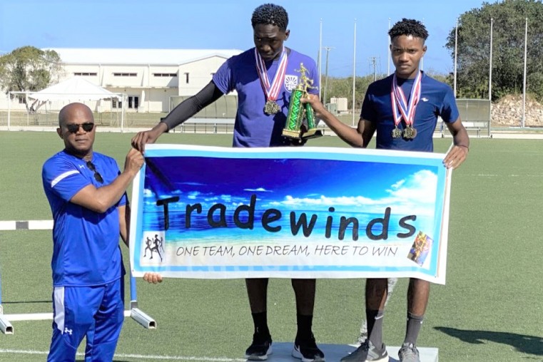 Acting Principal, Devon Bowen presenting trophies to joint Champion Boys - Romarco Morrison & Curtis Hunt
