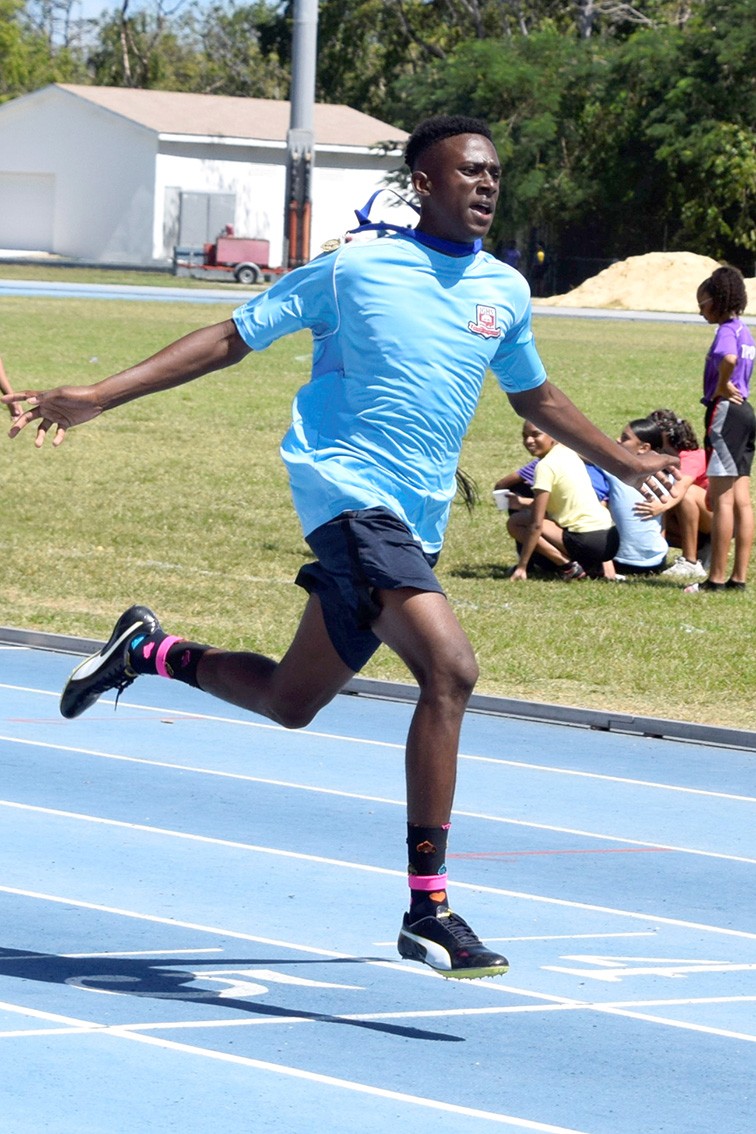 Jerrell Maize crosses the finish line