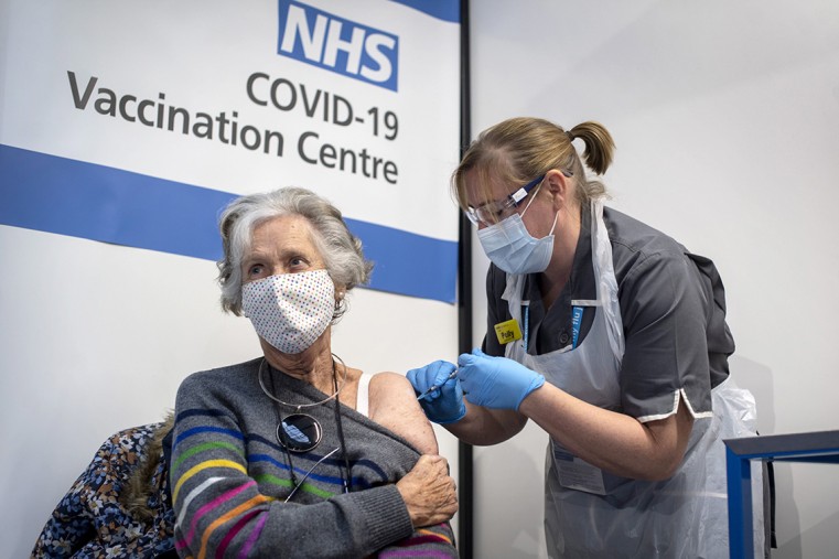 UK SETS YEAR-END COVID TARGET