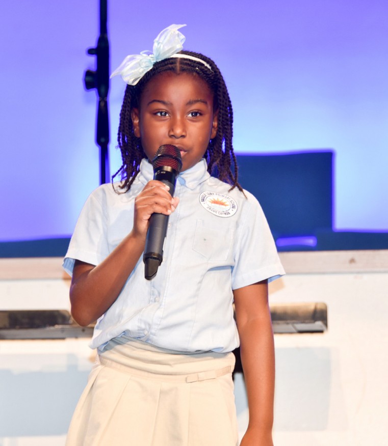 Theoline M McCoy Primary School student Zalaiyah Walters performs a speech solo on night one of the 2021 NCFA Final Concert