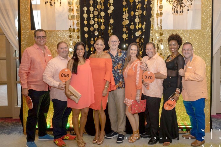Friends gather to support the Orange You Glad Gala and have a fun night!