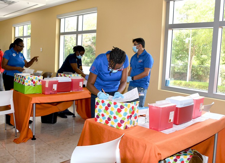 Public Health nurses at the mobile COVID-19 vaccination clinic at the Government Administration Building on Wednesday, 19 May