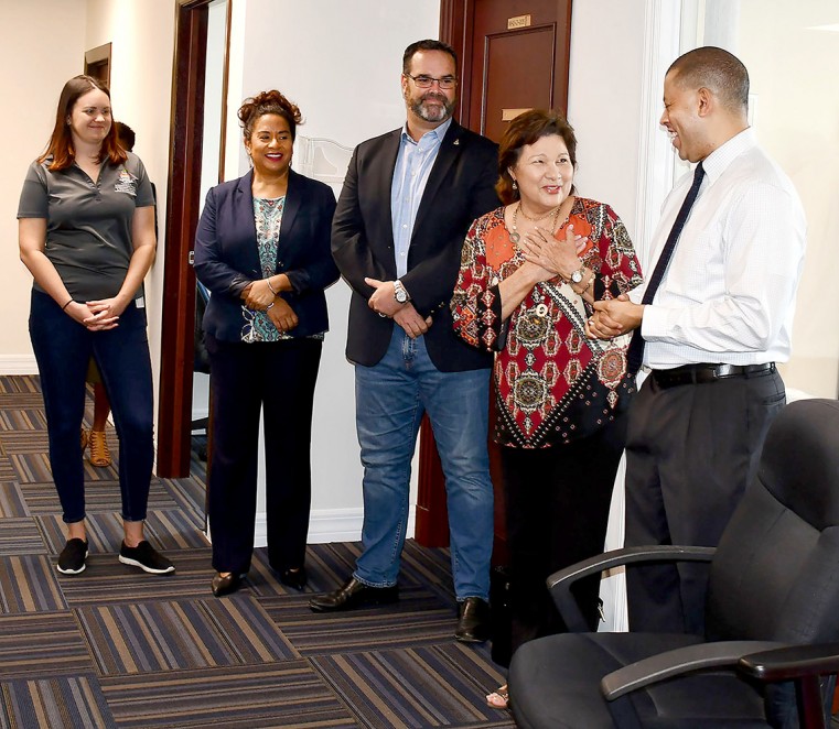 IIS&D Senior Policy Advisor, Stacie Sybersma; the Ministry’s Deputy Chief Officer Andrea Fa’amoe; Chief Officer Eric Bush and Parliamentary Secretary Heather Bodden look on as the Minister for Investment, Innovation and Social Development (II&SD), Hon. An