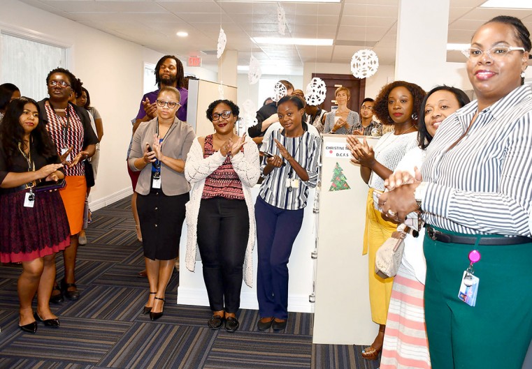 DCFS staff applaud the Minister for Investment, Innovation & Social Development, Hon. Andre Ebanks during this familiarisation tour on Wednesday, 12 May 2021