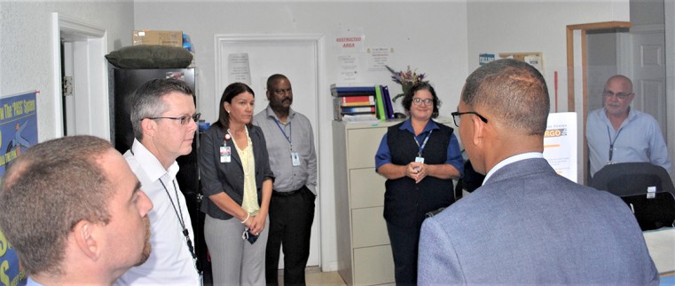 Minister Bryan Speaks with Cayman Airways staff at CAL Reservations Office