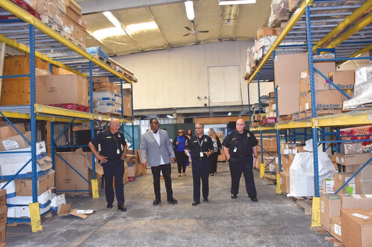 (L-R) CBC Deputy Director Kevin Walton, Deputy Premier Hon. Christopher Saunders, MP, CBC Director Charles Clifford and CBC Senior Deputy Director Bruce Smith tours the In Bond Warehouse