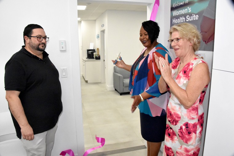Hon. Sabrina Turner cuts the ribbon, with Dr. Francisco Martinez and Dr. Sara Watkin