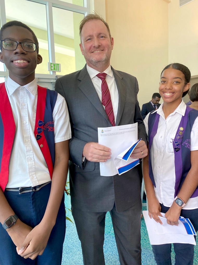 Principal Jon Clark with Head Boy Jelani Hanson and Head Girl Keanna Kelly