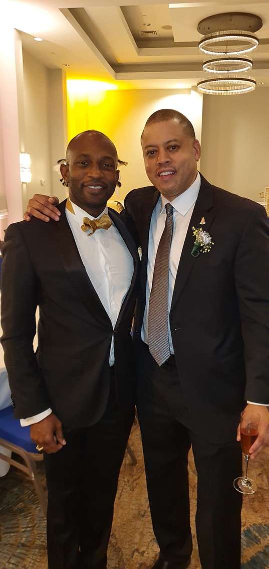 Attorney Richard Barton (L), along with Minister for Financial Services and Commerce Andre Ebanks