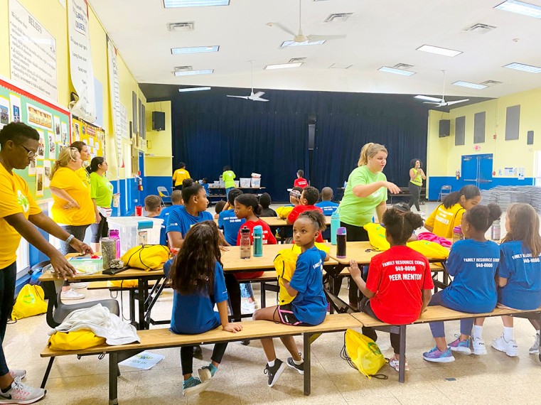 FRC’s Ms Charmaine Miller, Programme Coordinator, (front) leads campers through helpful “in the moment” coaching