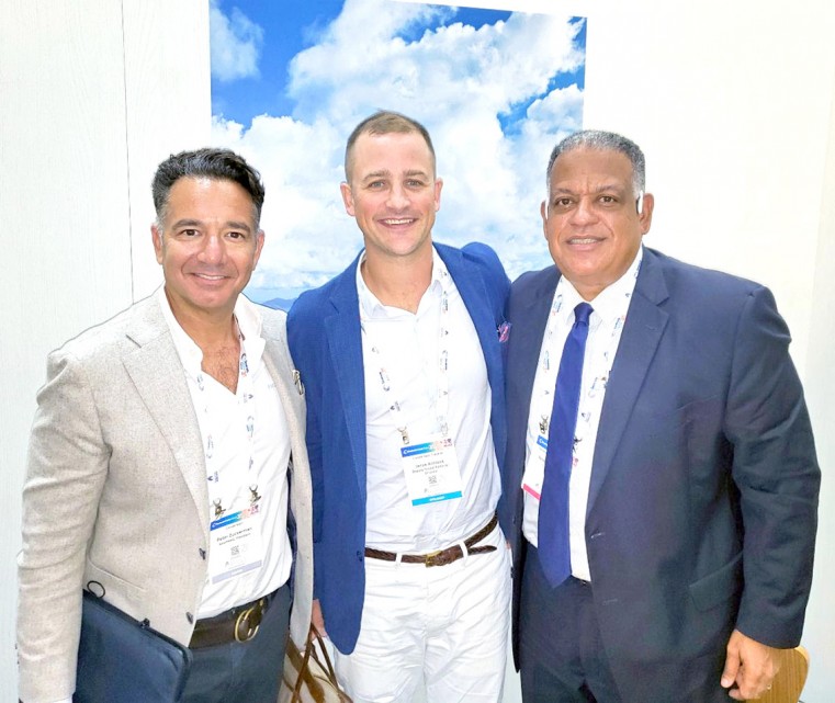 From left: Peter Zuckerman and Jesse Ashlock of Conde Nast Traveler with Commissioner Boschulte in Miami