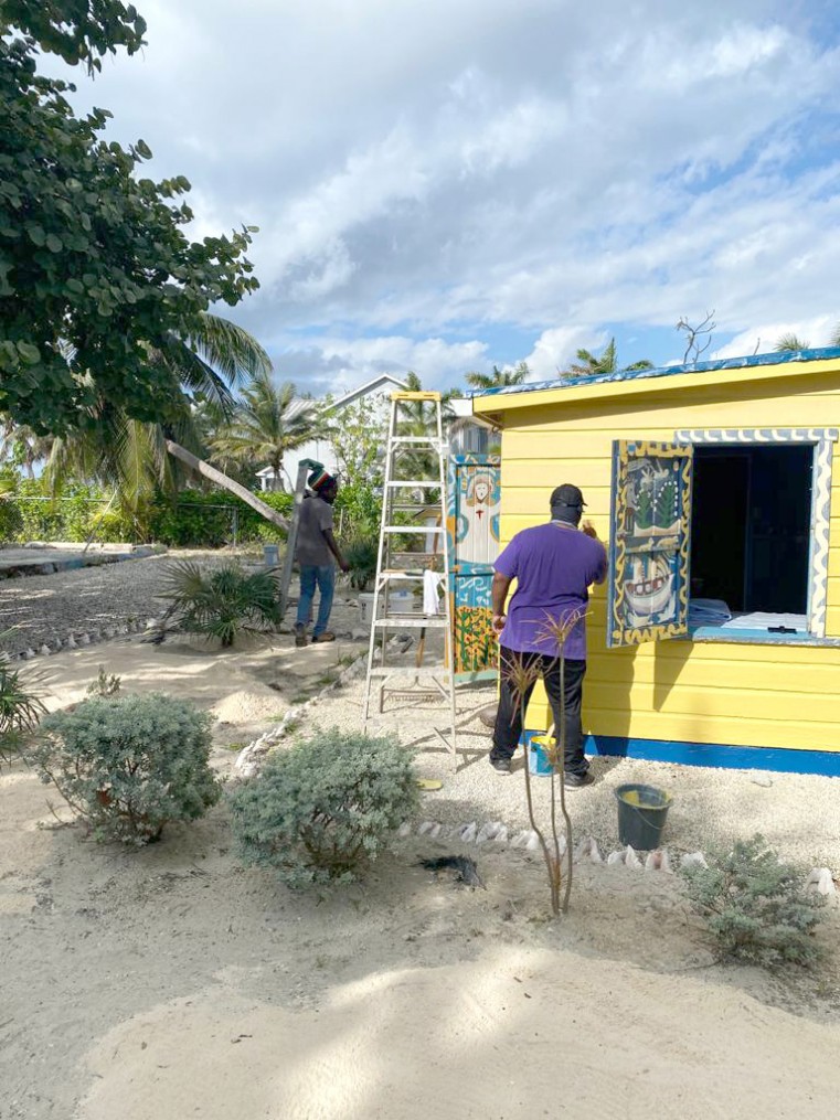 CNCF Staff Give Miss Lassie's House A Fresh Coat of Paint