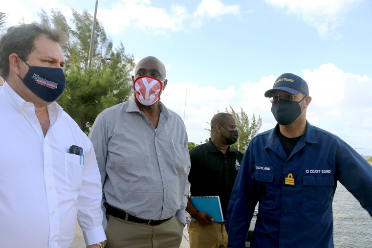 Cayman Islands Coast Guard Commander Robert Scotland with members of the National Security Council during a tour of the Coast Guard Compound. Premier Wayne Panton is pictured left, Attorney General Samuel is 2-left. Ministry of Border Control and Labour C