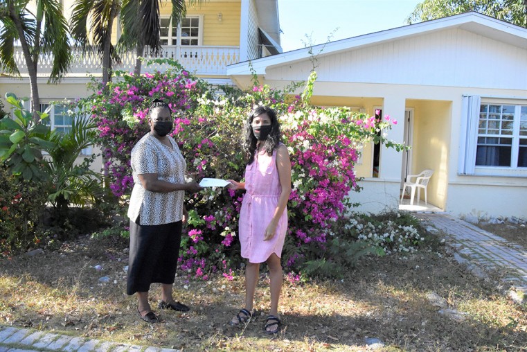 Resilience Cayman helps 105 year old pay her bills