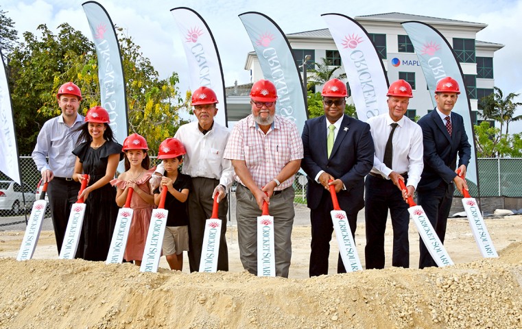 L-R: Dan Burke, Dara Flowers Burke, Alexandra Burke, Lucas Burke, Frank Flowers, Richard Flowers, Deputy Premier, Hon. Chris Saunders MP, Clarence Flowers, Jeremy Superfine