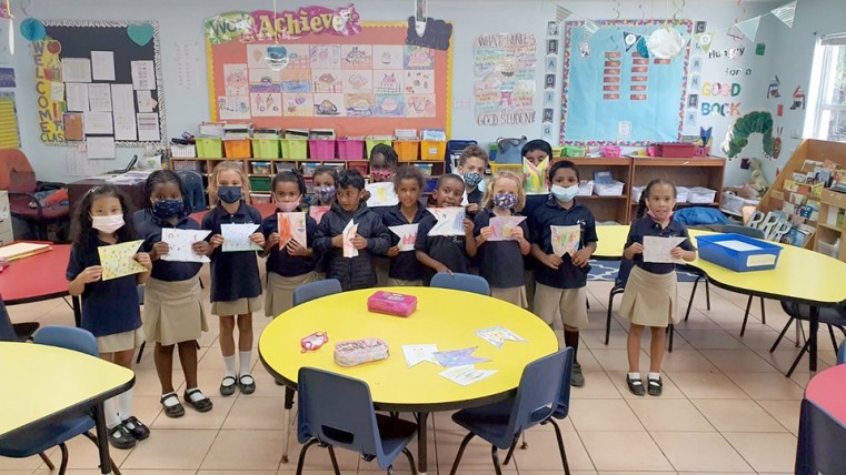First Baptist Christian School students display their bunting