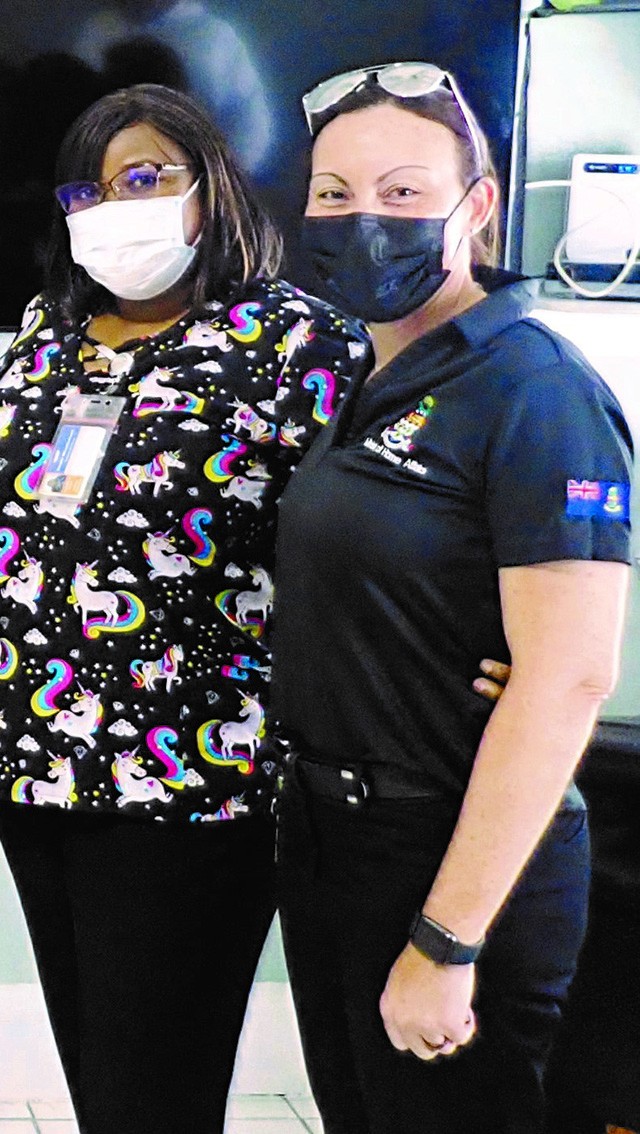 Nurse Yazzmine Smith of Her Majesty’s Prison Fairbanks with Ministry of Home Affairs Acting Deputy